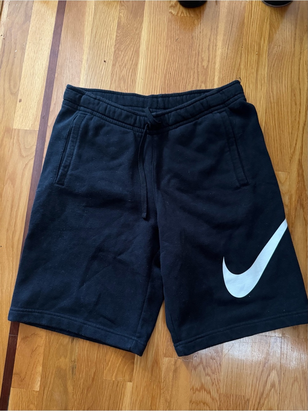 Nike Black Athletic Shorts with White Swoosh